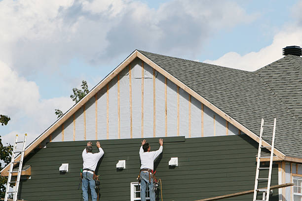 Professional Siding Replacement technician working in Arlington, OH